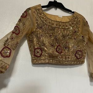 Indian golden embellished blouse with maroon beads